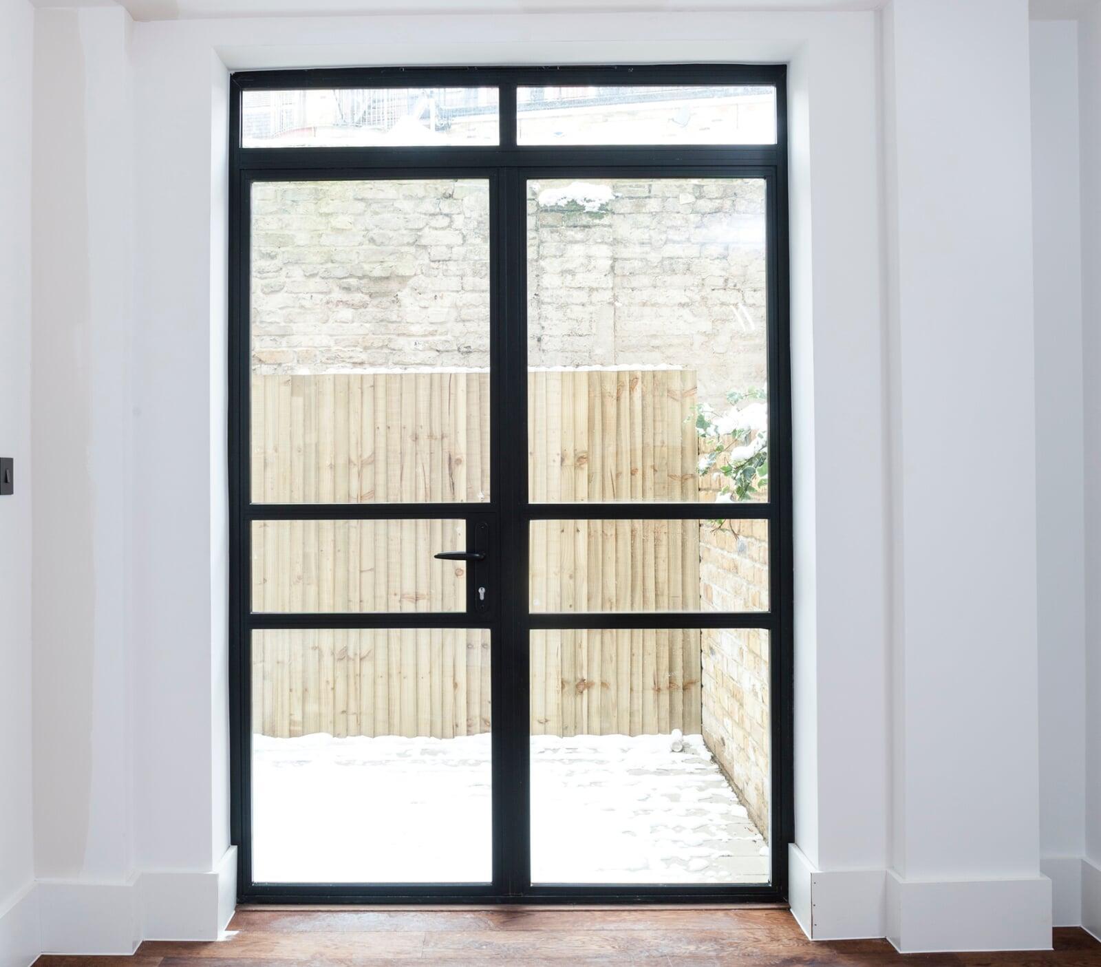 Contemporary aluminium door system installed by Bellevue Glazing