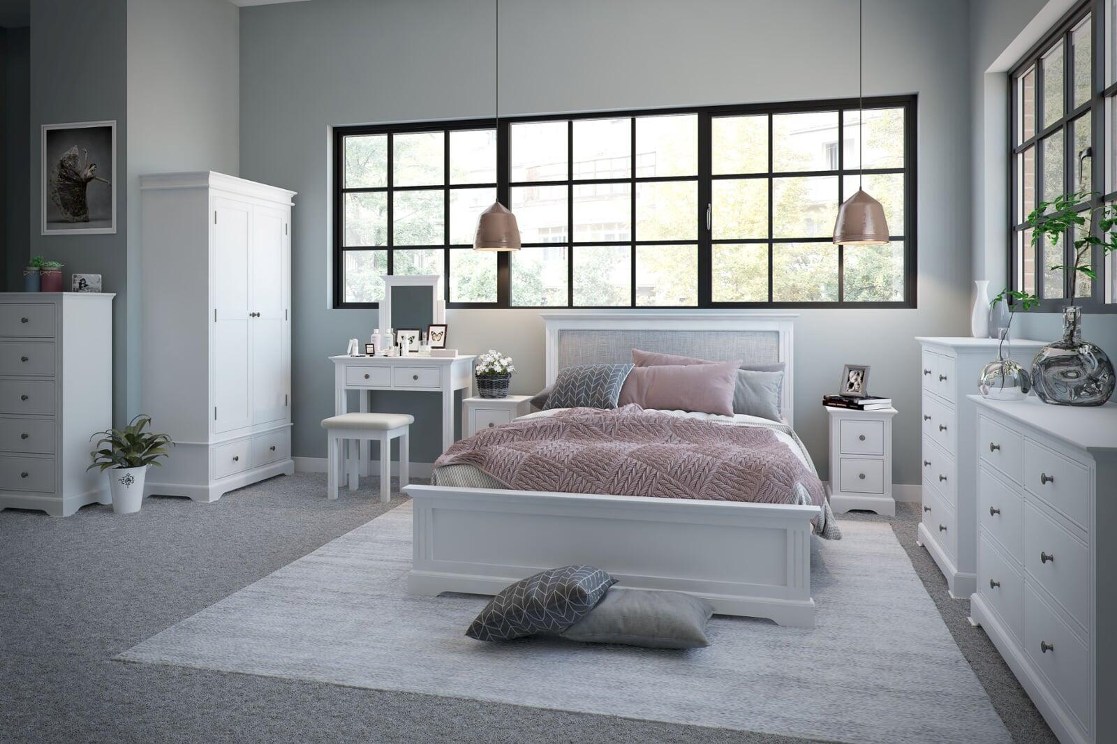 Large aluminium window with slim grid bars providing natural light in modern bedroom