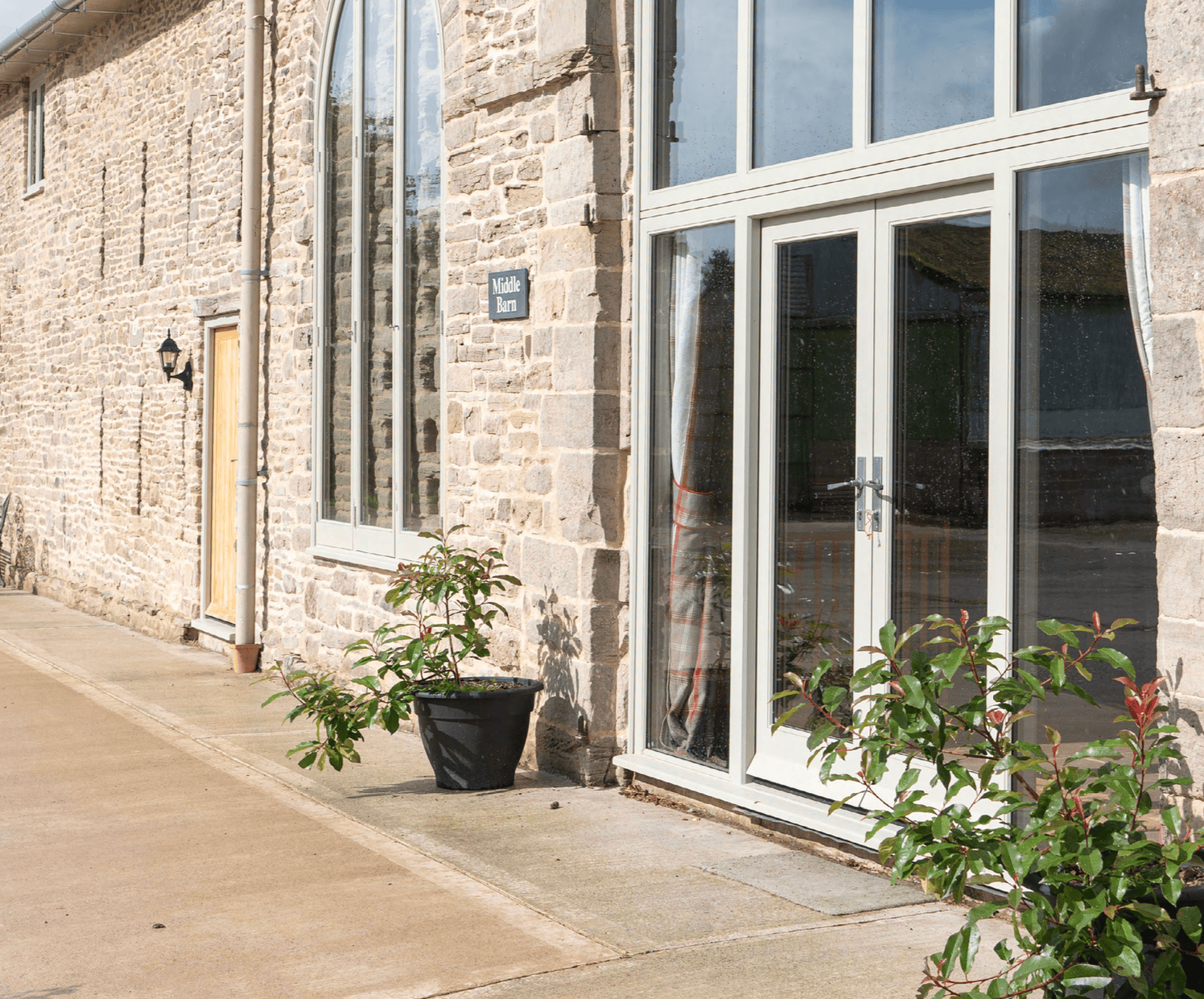 Traditional timber French doors with glass surround