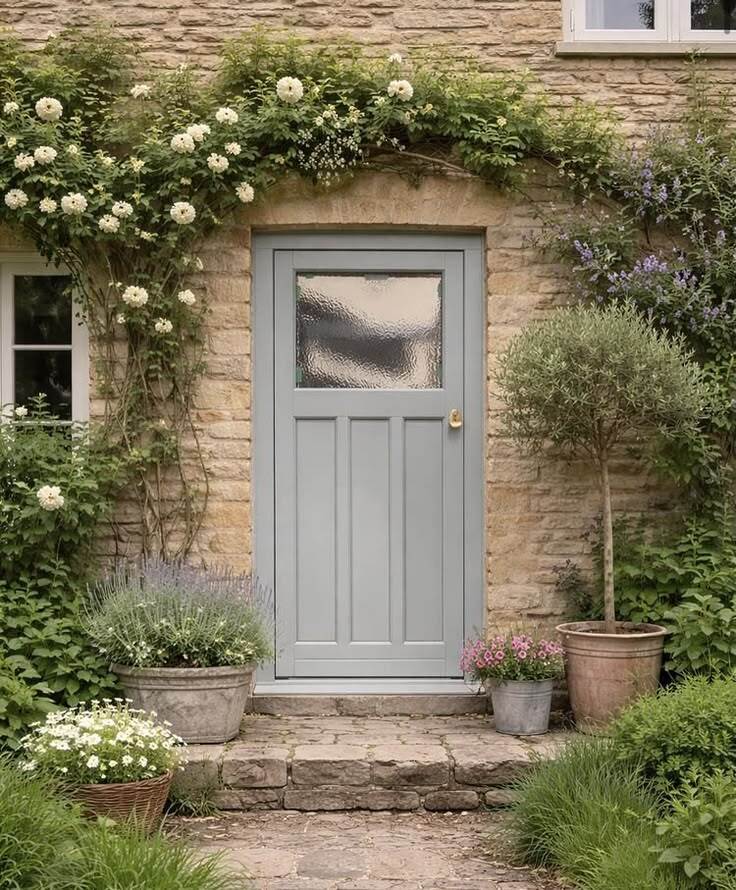 Residence RD heritage style entrance door in grey installed on a traditional stone cottage