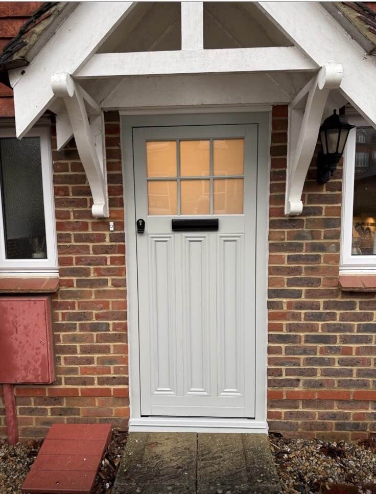 White Residence RD heritage entrance door with glazed panel on traditional brick home