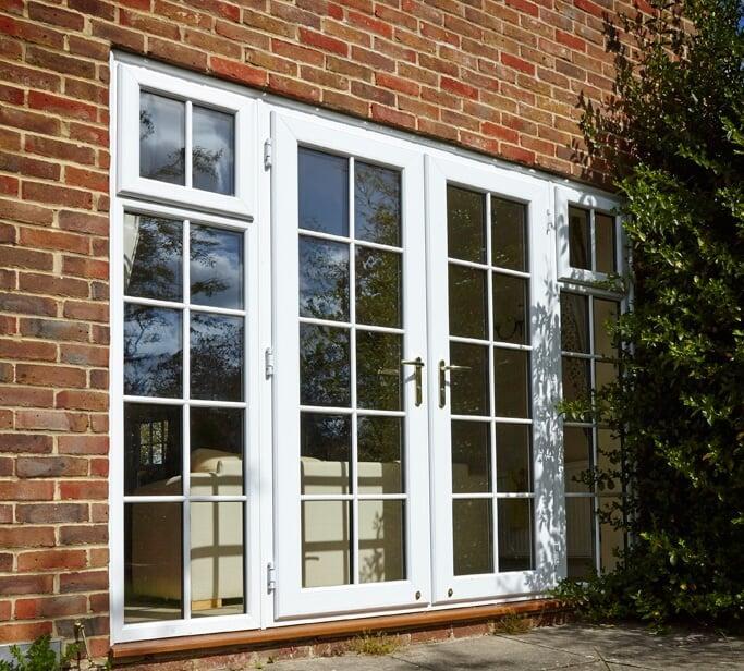 White PVC casement French doors with Georgian bars